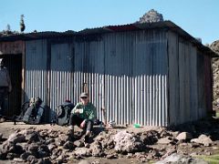03B Jerome Ryan Takes A Break At Mintos Hut On Descent To Chogoria On The Mount Kenya Trek October 2000